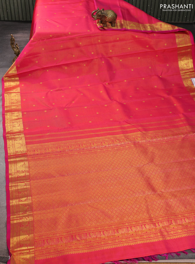Pure kanchipurams silk saree pink with allover vairaosi pattern & zari buttas and temple & paisley zari woven border