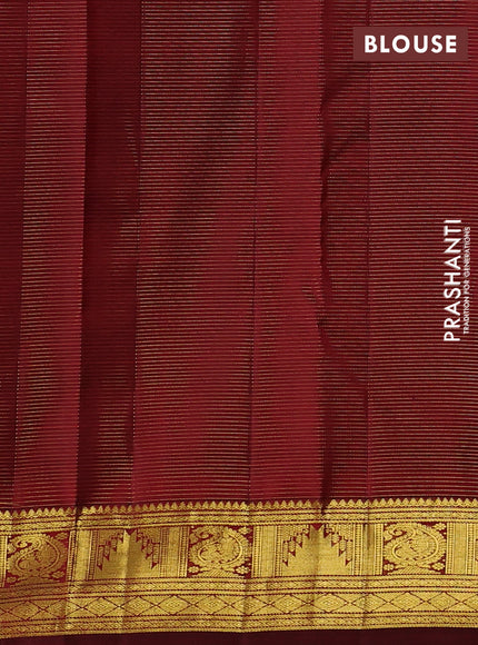 Pure kanchipurams silk saree maroon with allover vairaosi pattern & zari buttas and temple & paisley zari woven border
