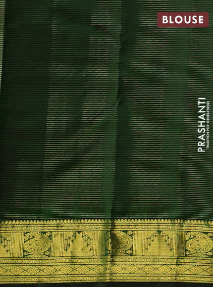 Pure kanchipurams silk saree green with allover vairaosi pattern & zari buttas and temple & paisley zari woven border