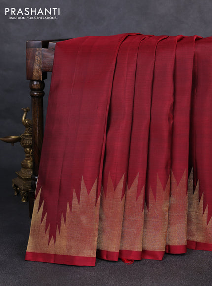 Pure kanchipurams silk saree maroon with zari woven buttas and temple design zari woven border