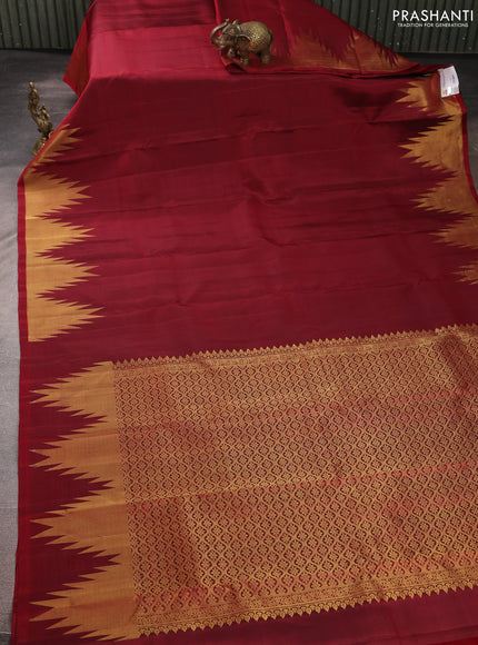Pure kanchipurams silk saree maroon with zari woven buttas and temple design zari woven border