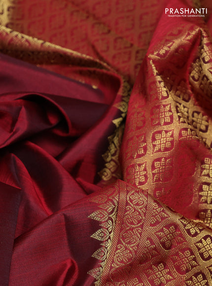 Pure kanchipurams silk saree maroon with zari woven buttas and temple design zari woven border