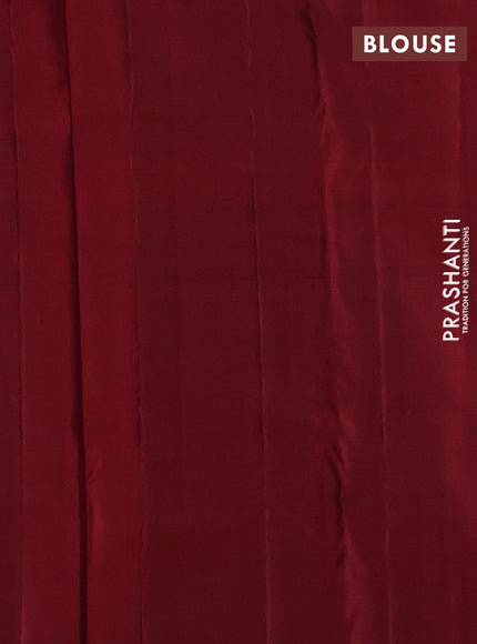 Pure kanchipurams silk saree maroon with zari woven buttas and temple design zari woven border