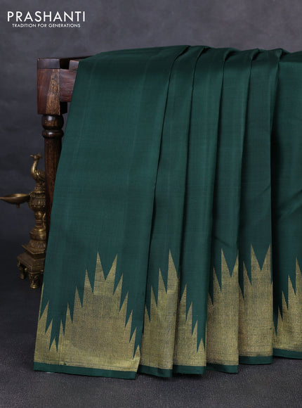 Pure kanchipurams silk saree bottle green with zari woven buttas and temple design zari woven border