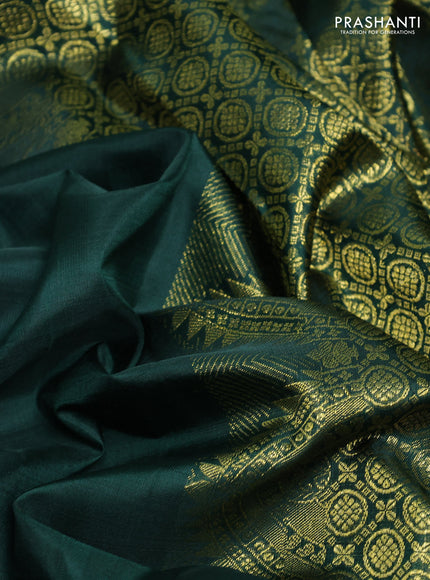Pure kanchipurams silk saree bottle green with zari woven buttas and temple design zari woven border