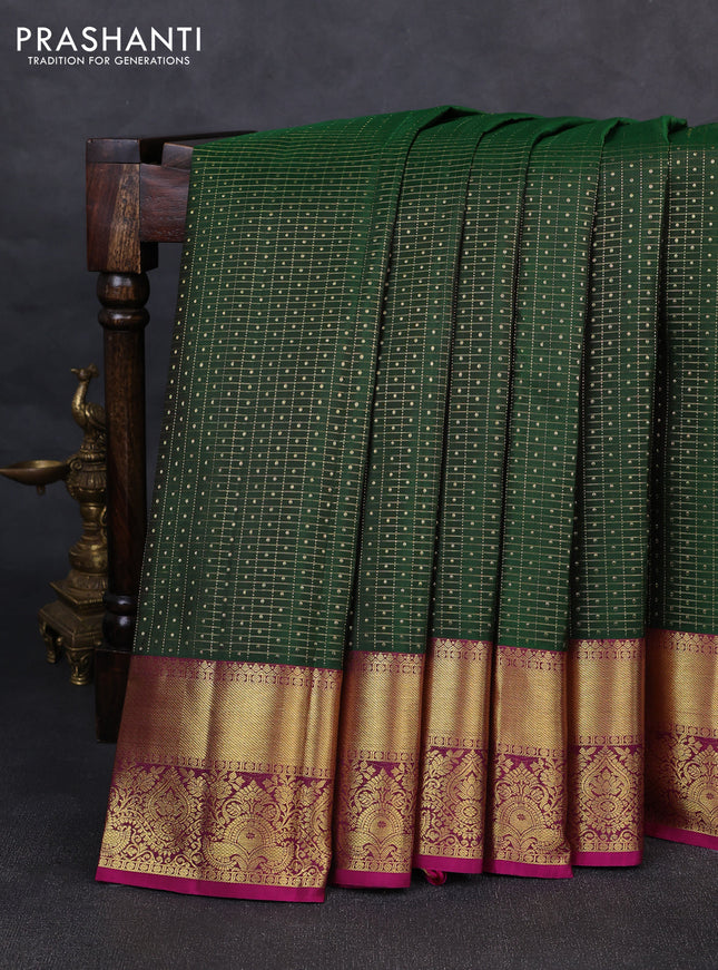 Pure kanchipurams silk saree green and magenta pink with allover small checks & buttas and rich zari woven border