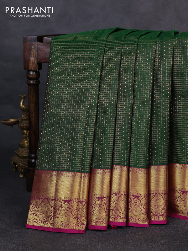 Pure kanchipurams silk saree green and magenta pink with allover small checks & buttas and rich zari woven border