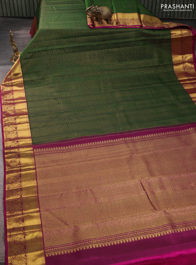 Pure kanchipurams silk saree green and magenta pink with allover small checks & buttas and rich zari woven border