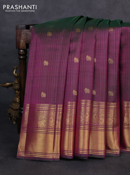 Pure kanchipurams silk saree dual shade of greenish purple with allover small checks & buttas and rich zari woven border