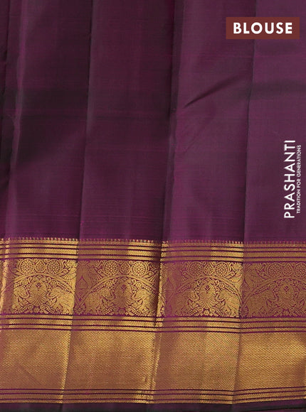 Pure kanchipurams silk saree dual shade of greenish purple with allover small checks & buttas and rich zari woven border