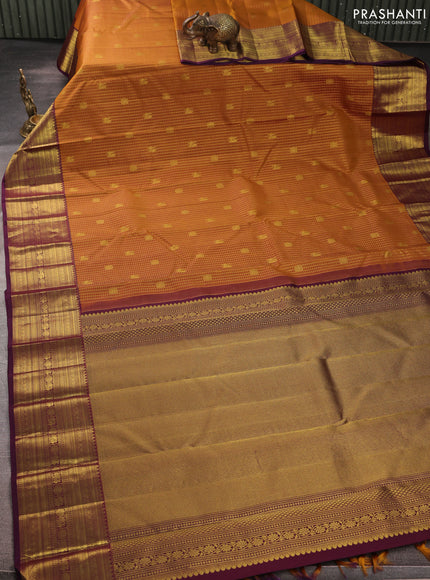 Pure kanchipurams silk saree dark mustard and purple with allover small checks & buttas and rich zari woven border