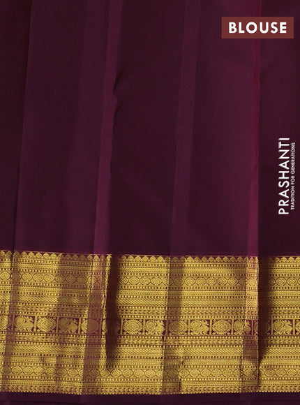Pure kanchipurams silk saree dark mustard and purple with allover small checks & buttas and rich zari woven border