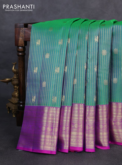 Pure kanchipurams silk saree teal green and purple with allover small zari checks & buttas and long zari woven border