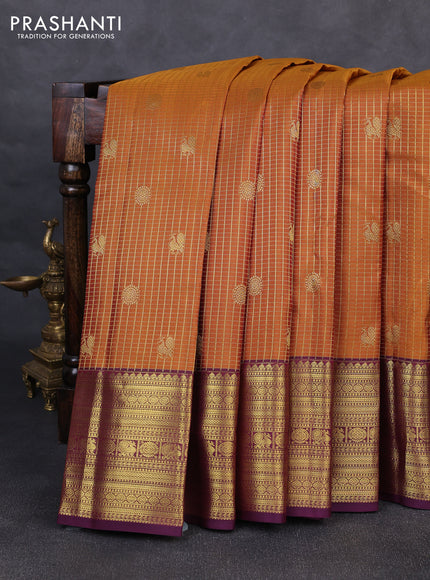 Pure kanchipurams silk saree dark mustard and deep purple with allover small zari checks & buttas and long zari woven border