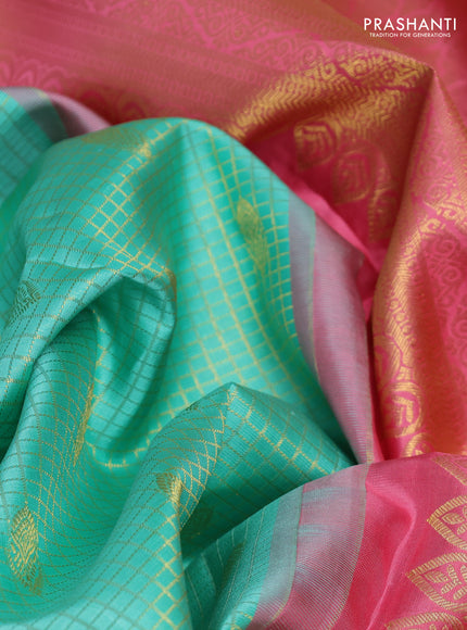 Pure kanchipurams silk saree teal blue and peach pink with allover small zari checks & buttas and long zari woven border