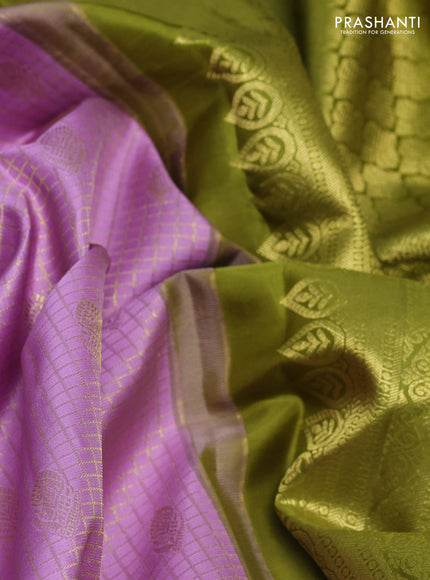 Pure kanchipurams silk saree lavender and mehendi green with allover small zari checks & buttas and long zari woven border