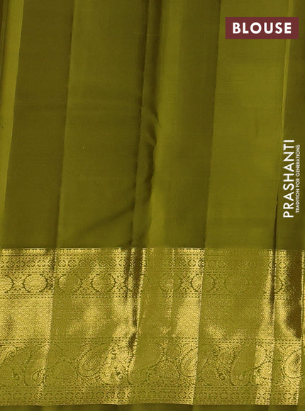 Pure kanchipurams silk saree lavender and mehendi green with allover small zari checks & buttas and long zari woven border