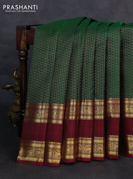 Pure kanchipurams silk saree green and maroon with allover small zari checks & buttas and rettapet zari woven border