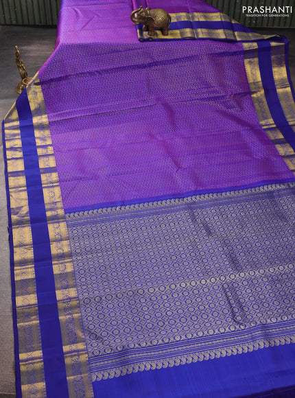 Pure kanchipurams silk saree purple and blue with allover small zari checks & buttas and rettapet zari woven border