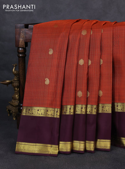Pure kanchipurams silk saree rust shade and wine shade with allover small zari checks & buttas and rettapet zari woven border