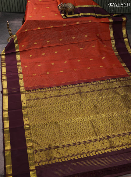Pure kanchipurams silk saree rust shade and wine shade with allover small zari checks & buttas and rettapet zari woven border