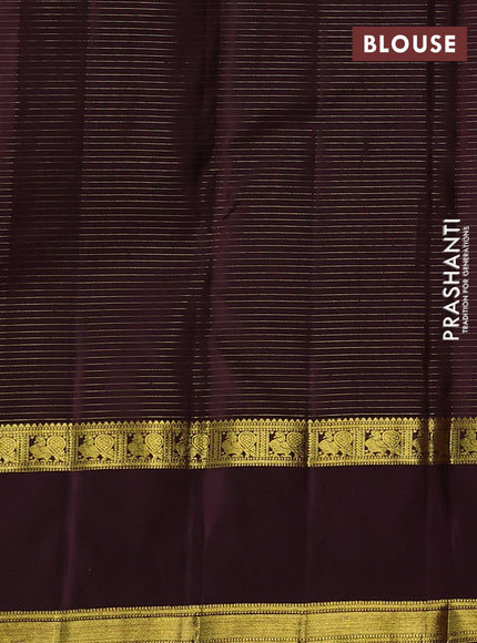 Pure kanchipurams silk saree rust shade and wine shade with allover small zari checks & buttas and rettapet zari woven border
