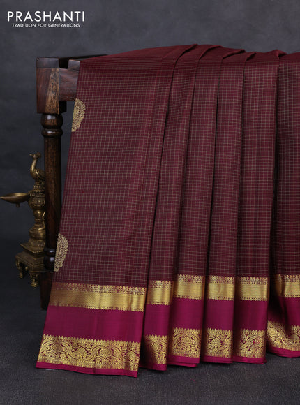 Pure kanchipurams silk saree deep maroon and dark magenta pink with allover small zari woven checked pattern and rettapet zari woven border