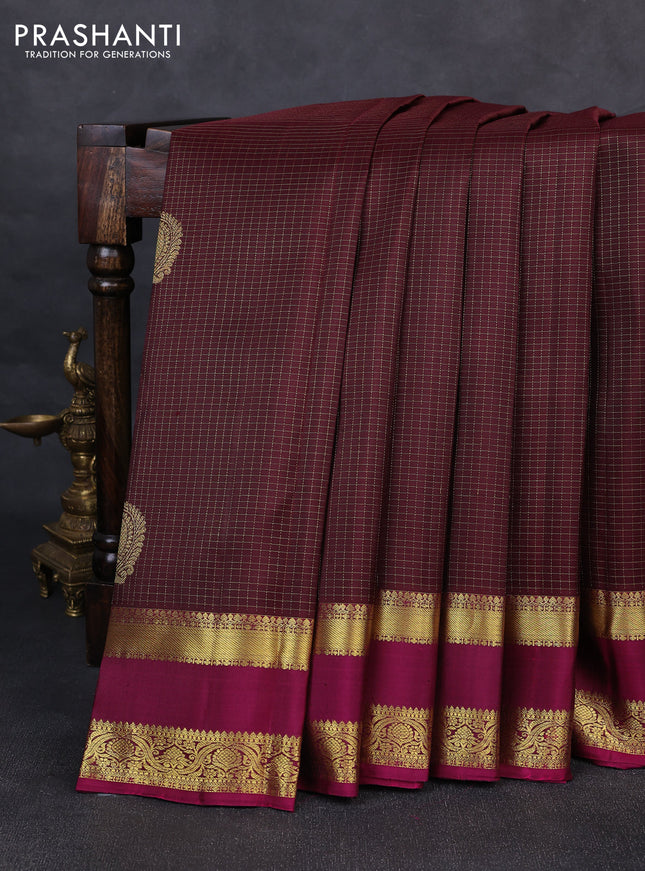 Pure kanchipurams silk saree deep maroon and dark magenta pink with allover small zari woven checked pattern and rettapet zari woven border