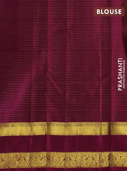 Pure kanchipurams silk saree deep maroon and dark magenta pink with allover small zari woven checked pattern and rettapet zari woven border