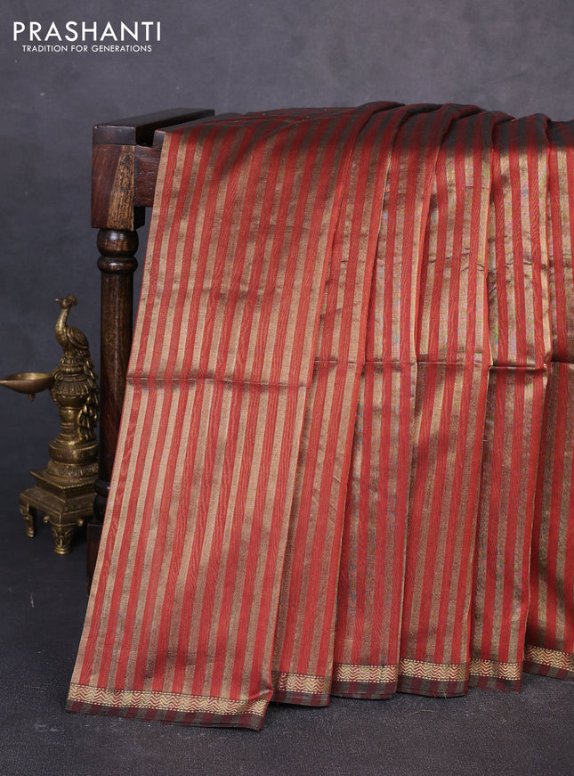 Maheswari silk cotton saree rust shade with allover stripe pattern and zari woven border