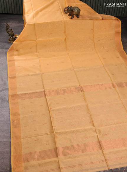 Maheswari silk cotton saree pale orange with copper zari woven buttas and copper zari woven border
