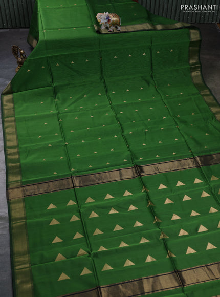 Maheswari silk cotton saree green and black with zari woven geometric buttas and zari woven border