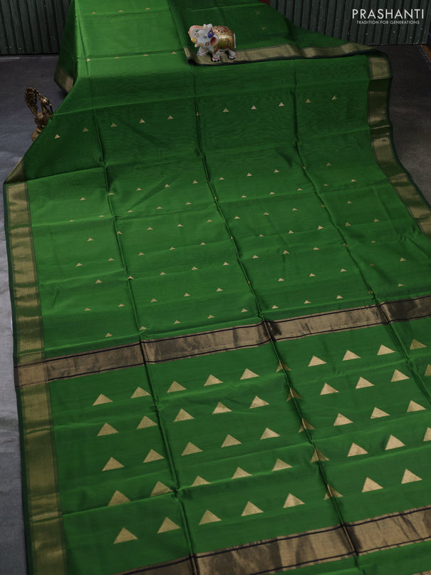 Maheswari silk cotton saree green and black with zari woven geometric buttas and zari woven border