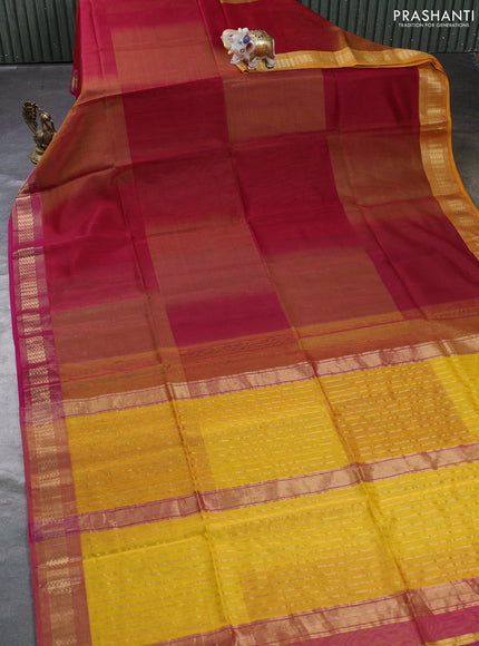 Maheswari silk cotton saree maroon and mango yellow with plain body and zari woven border