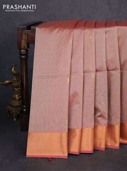 Maheswari silk cotton saree pastel peach and orange with allover zari weaves and zari woven border