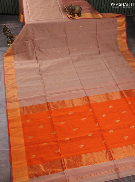 Maheswari silk cotton saree pastel peach and orange with allover zari weaves and zari woven border