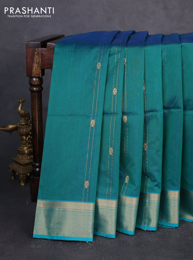 Maheswari silk cotton saree teal green and cs blue with allover zari weaves and zari woven border