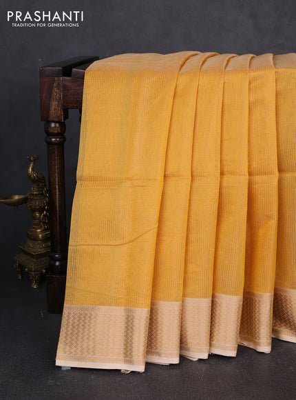 Maheswari silk cotton saree yellow and pale yellow with allover small zari woven checked pattern and zari woven border