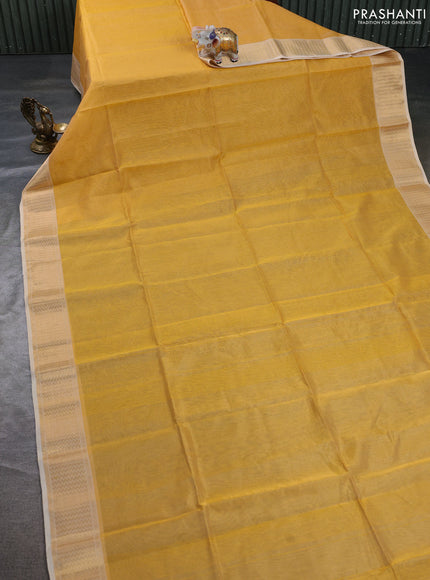 Maheswari silk cotton saree yellow and pale yellow with allover small zari woven checked pattern and zari woven border