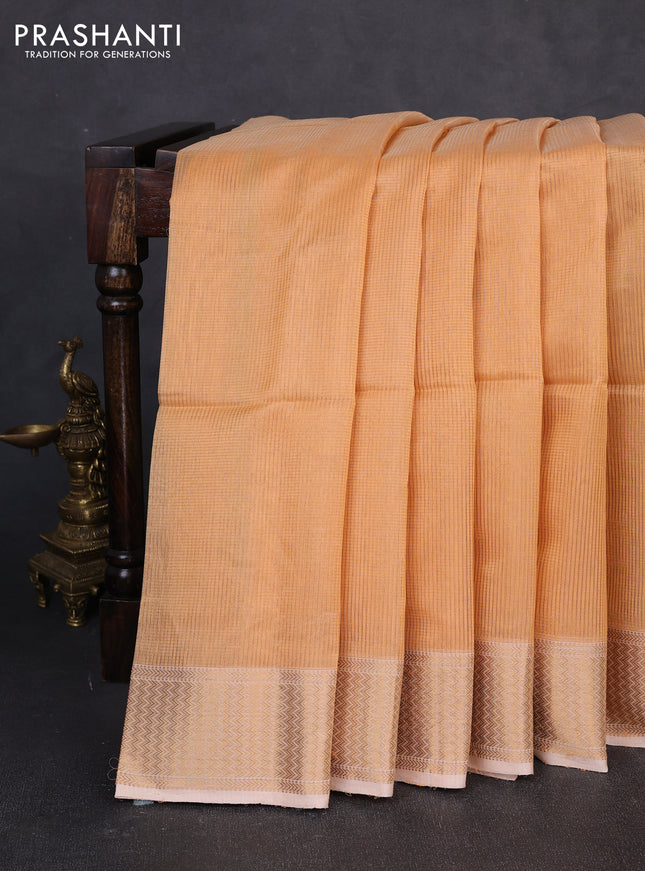 Maheswari silk cotton saree pale orange with allover small zari woven checked pattern and zari woven border
