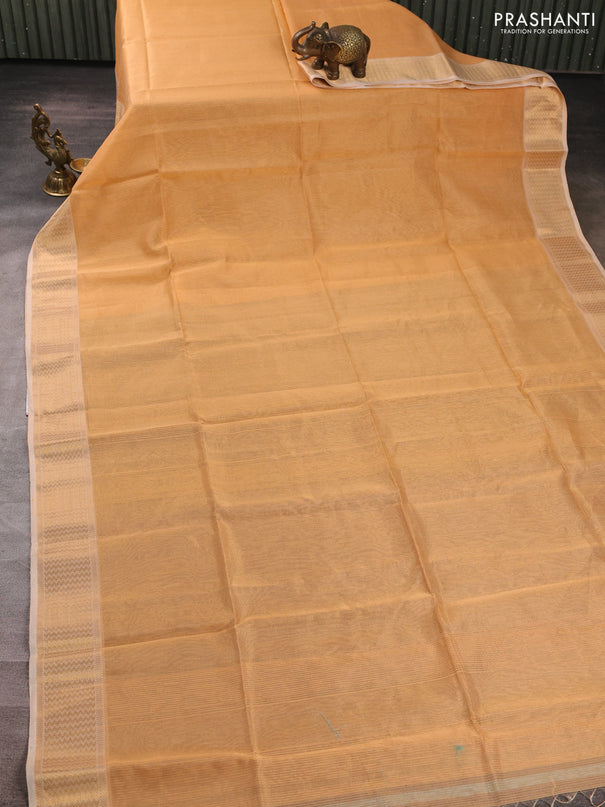 Maheswari silk cotton saree pale orange with allover small zari woven checked pattern and zari woven border