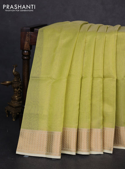 Maheswari silk cotton saree lime green with allover zari stripe pattern and zari woven border