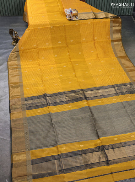 Maheswari silk cotton saree mustard yellow and black with allover stripe pattern & zari buttas and zari woven border
