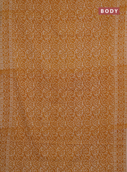 Kalamkari cotton saree mustard yellow with allover prints and printed border