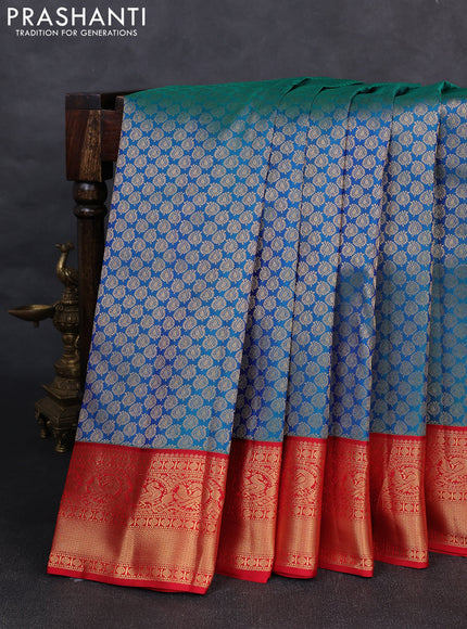 Pure kanchipuram silk saree dual shade of bluish green and red with allover zari woven brocade weaves and rich zari woven korvai border