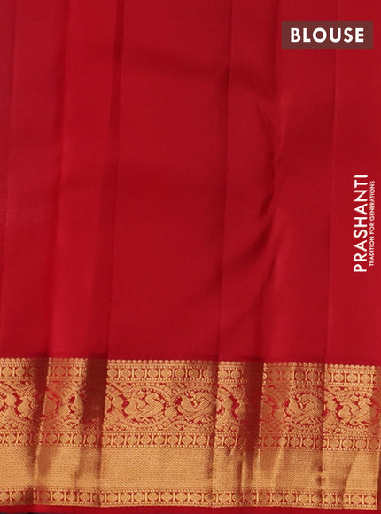 Pure kanchipuram silk saree dual shade of bluish green and red with allover zari woven brocade weaves and rich zari woven korvai border