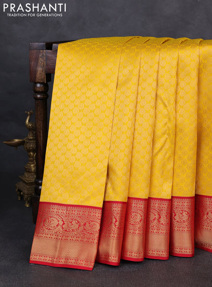 Pure kanchipuram silk saree yellow and red with allover zari woven brocade weaves and rich zari woven korvai border