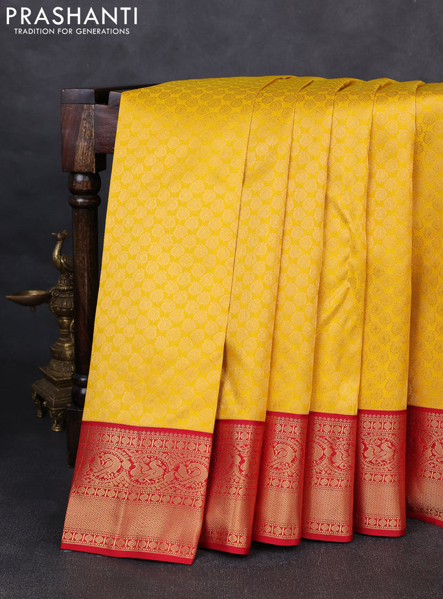 Pure kanchipuram silk saree yellow and red with allover zari woven brocade weaves and rich zari woven korvai border
