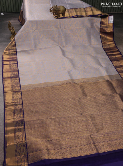 Pure kanchipuram silk saree grey and navy blue with allover zari woven brocade weaves and rich zari woven korvai border