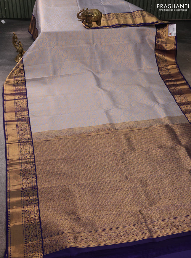 Pure kanchipuram silk saree grey and navy blue with allover zari woven brocade weaves and rich zari woven korvai border